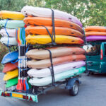 Trailer with kayaks and paddles